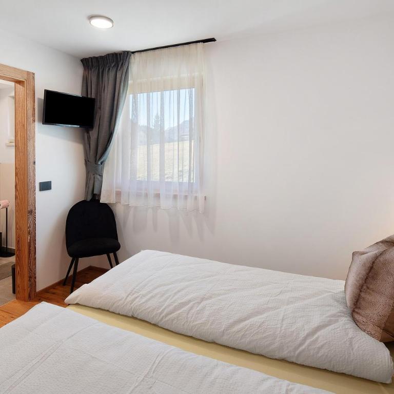 Cesa Pattis - Appartamento Deluxe con 2 Camere da Letto e Vista Giardino - 16