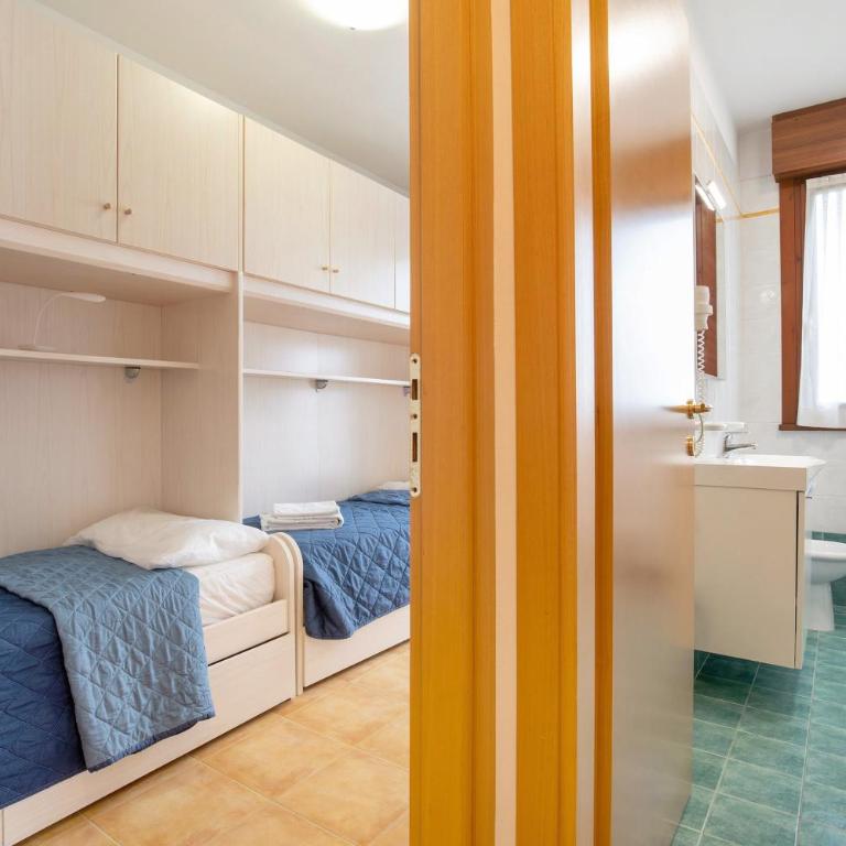 Residence Papaya A102 - Appartamento Deluxe con 2 Camere da Letto e Vista Giardino - 17