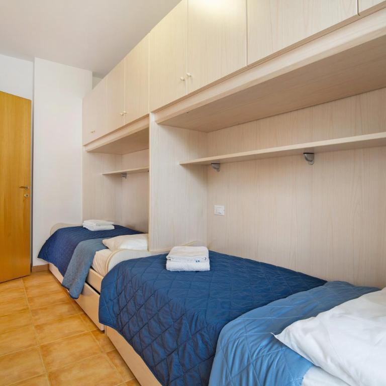 Residence Papaya A102 - Appartamento Deluxe con 2 Camere da Letto e Vista Giardino - 16