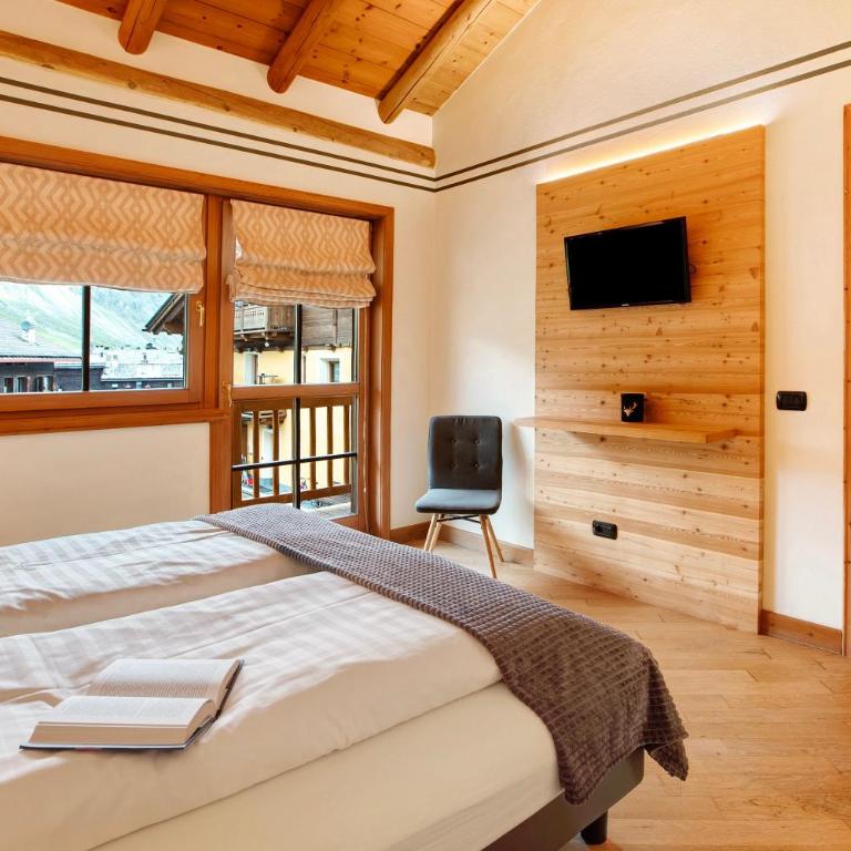 Villa Nordica Aurora - Appartamento Deluxe con 2 Camere da Letto e Vista Giardino - 11
