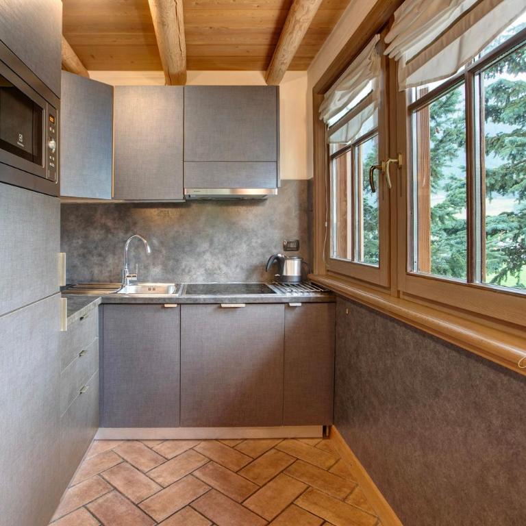 Villa Nordica Aurora - Appartamento Deluxe con 2 Camere da Letto e Vista Giardino - 9