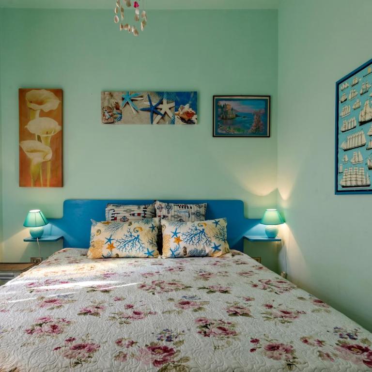 Casa Erica - Appartamento Deluxe con 2 Camere da Letto e Vista Giardino - 10