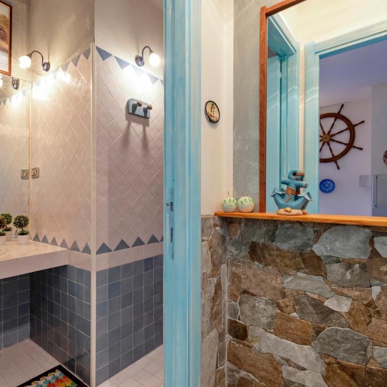 Casa Erica - Appartamento Deluxe con 2 Camere da Letto e Vista Giardino - 14