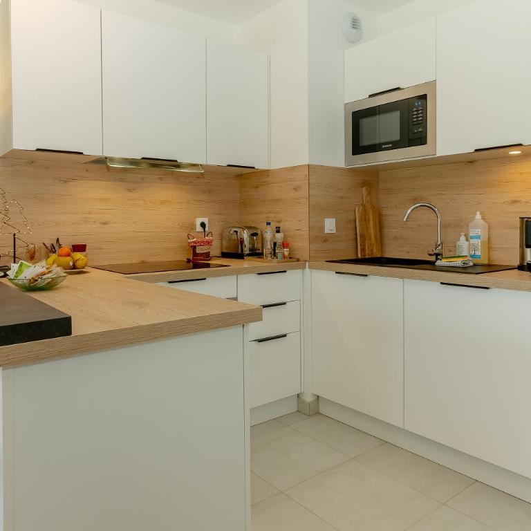 Appartement Gentiane - Appartamento Deluxe con 2 Camere da Letto e Vista Giardino - 8