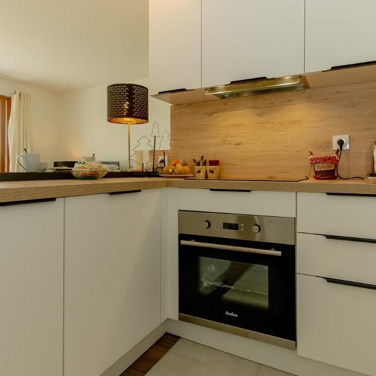 Appartement Gentiane - Appartamento Deluxe con 2 Camere da Letto e Vista Giardino - 10