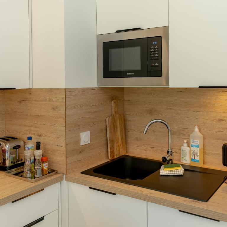 Appartement Gentiane - Appartamento Deluxe con 2 Camere da Letto e Vista Giardino - 12