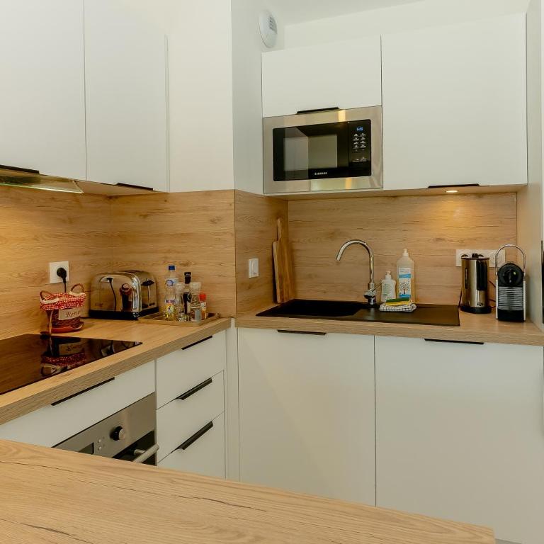 Appartement Gentiane - Appartamento Deluxe con 2 Camere da Letto e Vista Giardino - 11