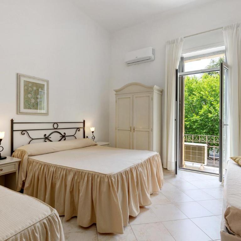 Affittacamere Borgo Trento - Camera Quadrupla con Doccia - 1