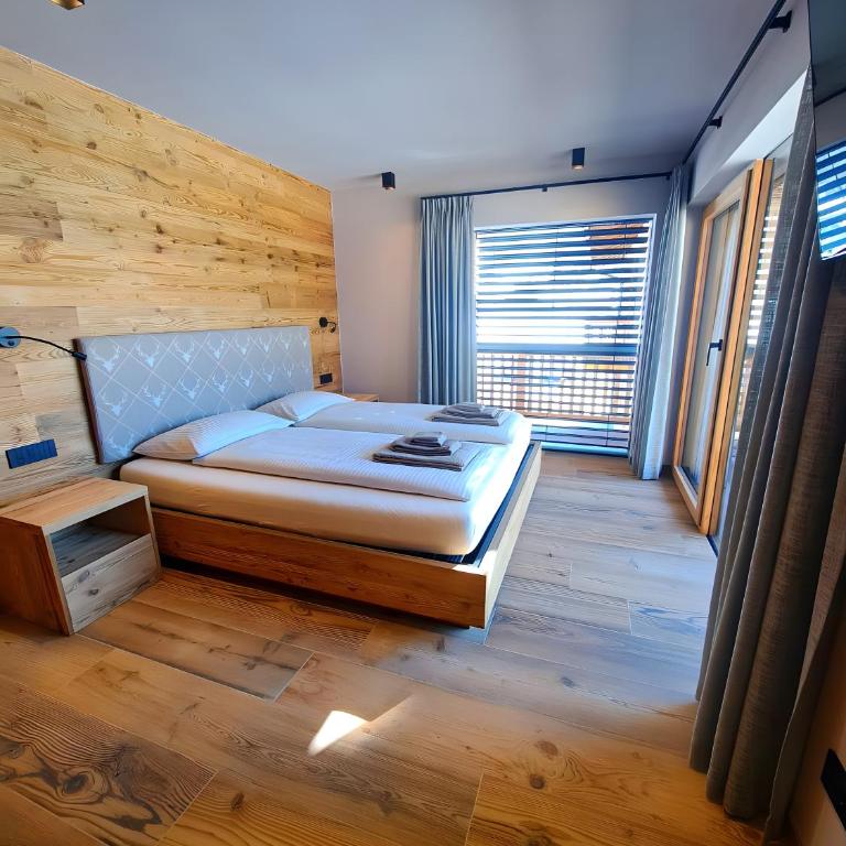 Arctik Chalet Livigno - Appartamento Deluxe con 2 Camere da Letto e Vista Giardino - 6