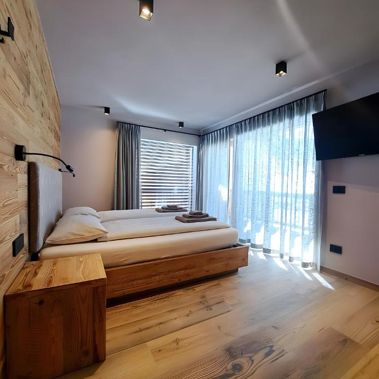 Arctik Chalet Livigno - Appartamento Deluxe con 2 Camere da Letto e Vista Giardino - 5