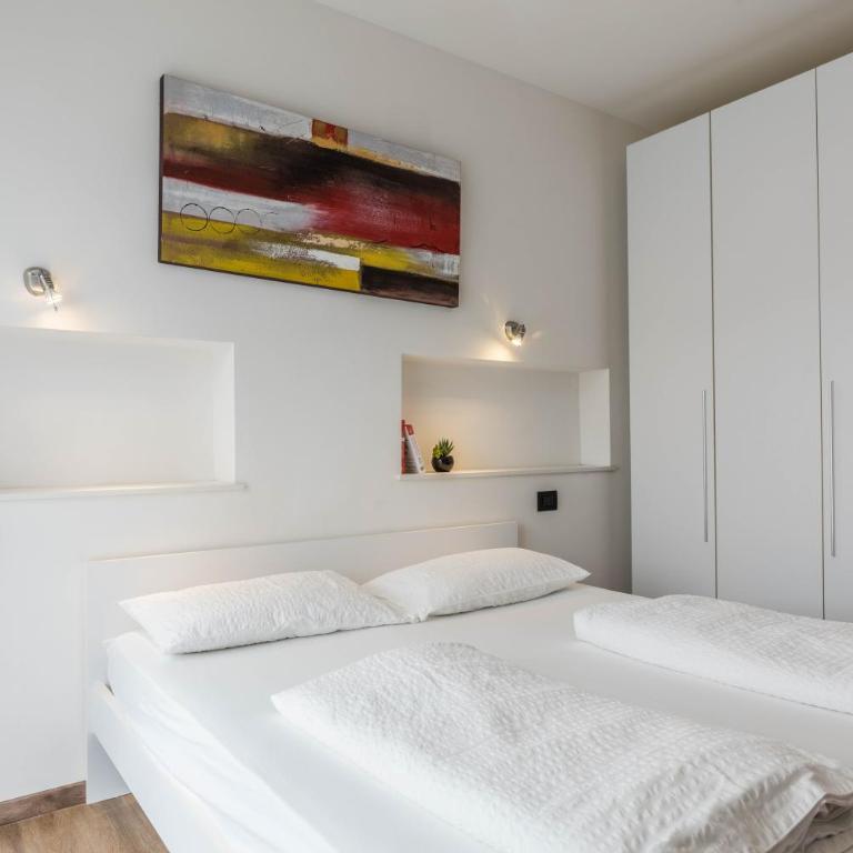 Residence La Pergola trilocale - Appartamento Deluxe con 2 Camere da Letto e Balcone - 12