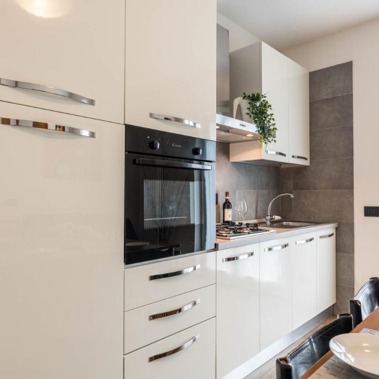 Residence La Pergola trilocale - Appartamento Deluxe con 2 Camere da Letto e Balcone - 10