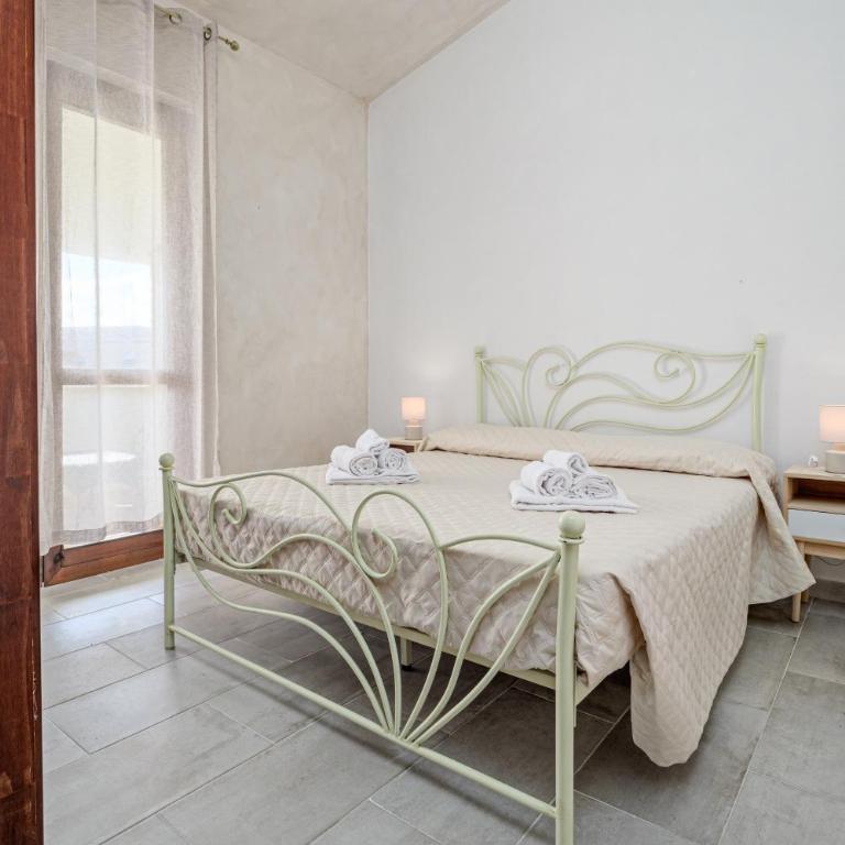 Brezza Marina Apartment- Terrace - Appartamento Deluxe con 2 Camere da Letto e Vista Giardino - 7