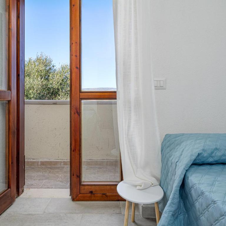 Brezza Marina Apartment- Terrace - Appartamento Deluxe con 2 Camere da Letto e Vista Giardino - 15