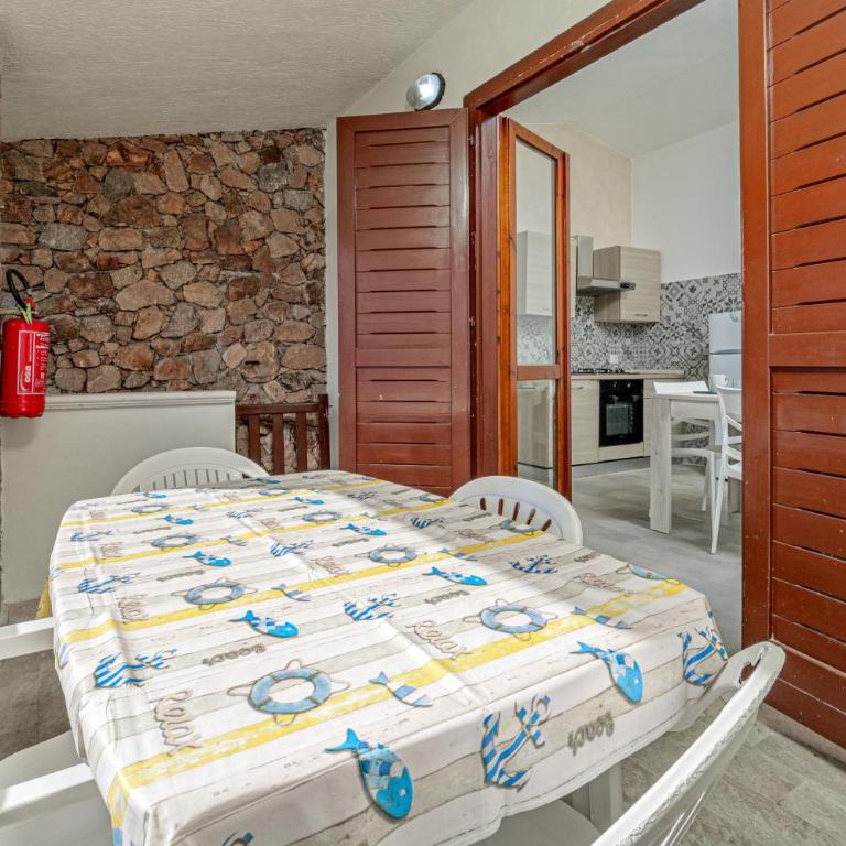 Brezza Marina Apartment- Terrace - Appartamento Deluxe con 2 Camere da Letto e Vista Giardino - 3