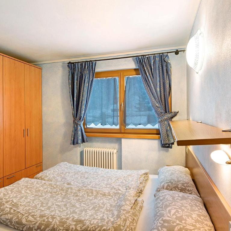 Appartamento Cima Cavalli - Appartamento Deluxe con 2 Camere da Letto e Vista Giardino - 1