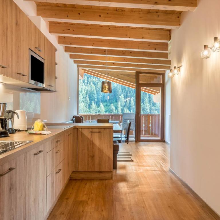 Hotel Residence Gardena Saslong - Appartamento Deluxe con 2 Camere da Letto e Vista Giardino - 4