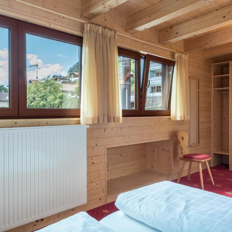 Hotel Residence Gardena Saslong - Appartamento Deluxe con 2 Camere da Letto e Vista Giardino - 14