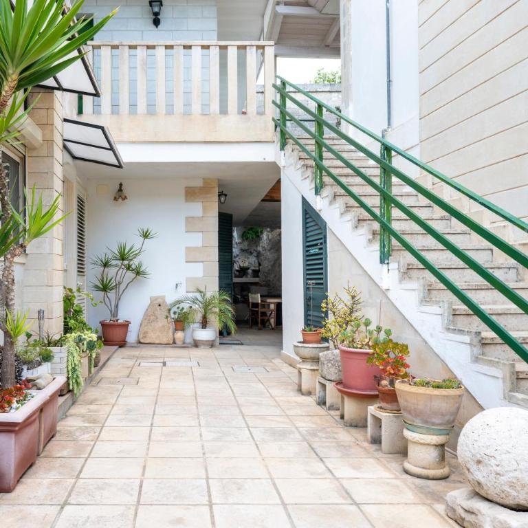 Atenaion Otranto - Appartamento Deluxe con 2 Camere da Letto e Vista Giardino - 1