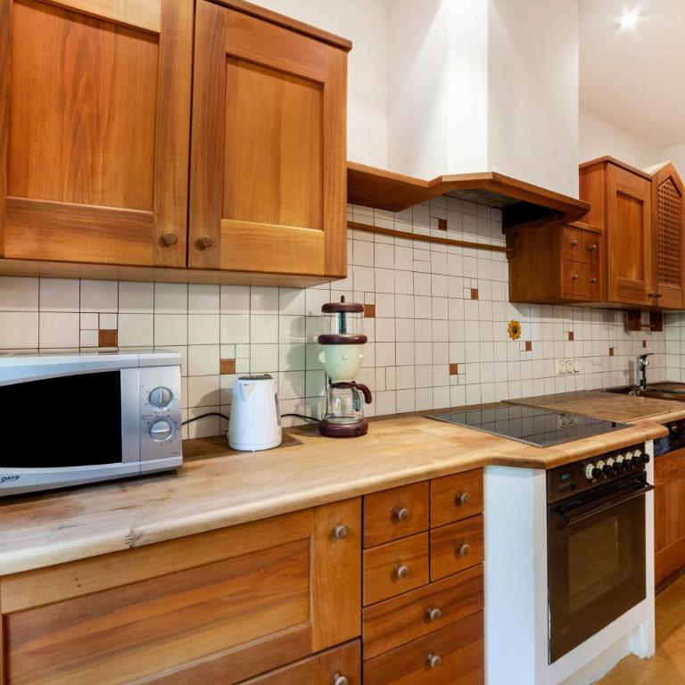 Villa Coris Ferienwohnung Magnolia - Appartamento Deluxe con 2 Camere da Letto e Vista Giardino - 8