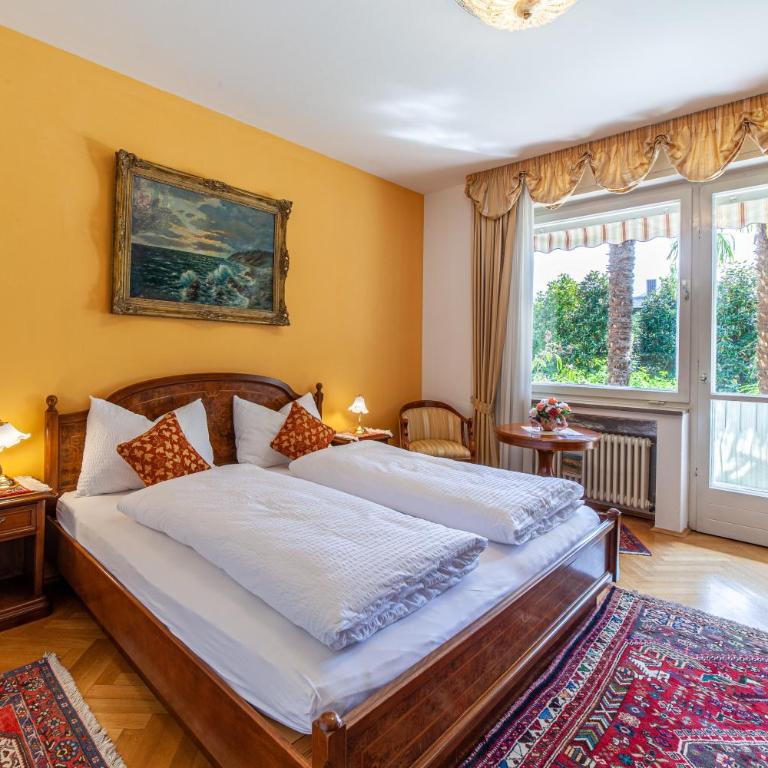 Villa Coris Ferienwohnung Magnolia - Appartamento Deluxe con 2 Camere da Letto e Vista Giardino - 1