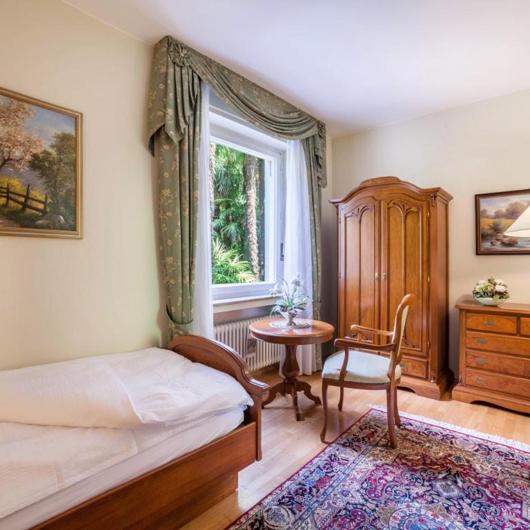 Villa Coris Ferienwohnung Magnolia - Appartamento Deluxe con 2 Camere da Letto e Vista Giardino - 6