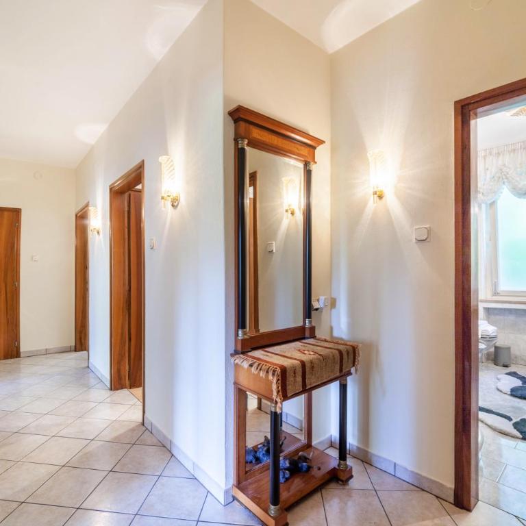 Villa Coris Ferienwohnung Magnolia - Appartamento Deluxe con 2 Camere da Letto e Vista Giardino - 17