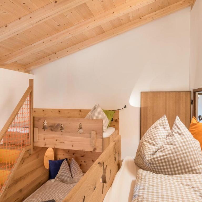 Schartneralm Zirbel Family - Deluxe-Apartment mit 2 Schlafzimmern und Gartenblick - 21