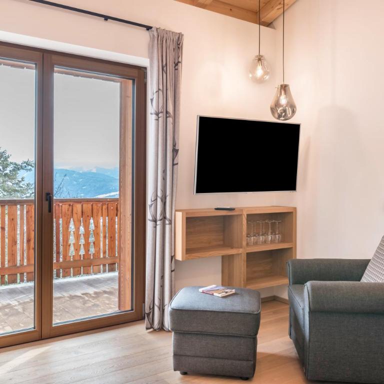 Schartneralm Zirbel Family - Deluxe-Apartment mit 2 Schlafzimmern und Gartenblick - 12