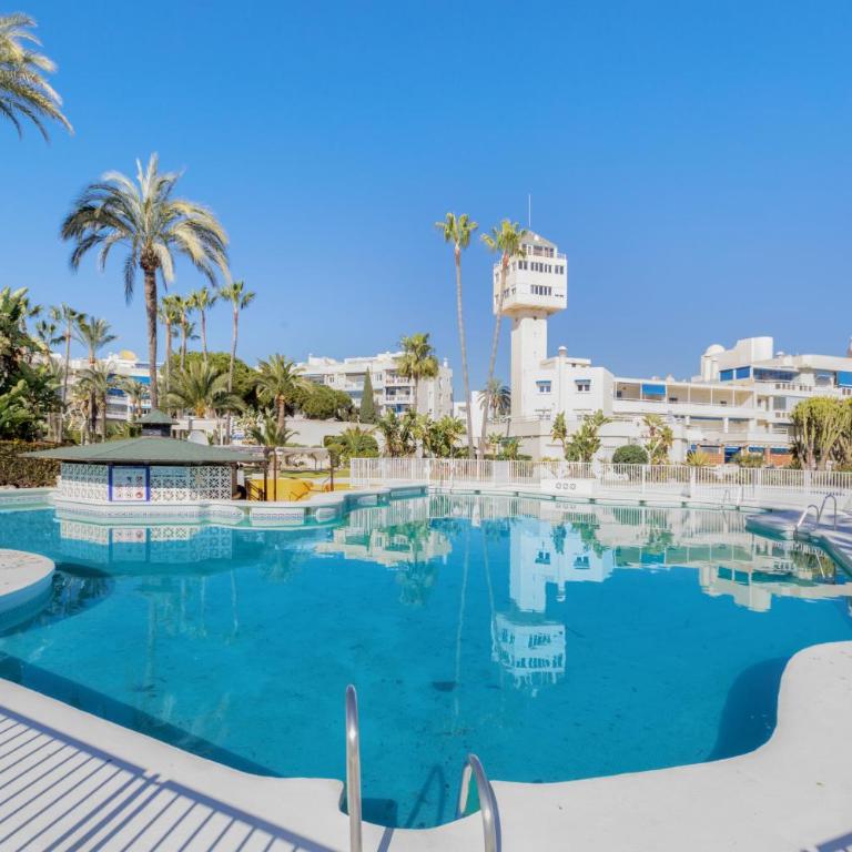 Apartamento Junto al Mar Costa Lago - Apartamento Deluxe de 2 dormitorios con vistas al jardín - 1