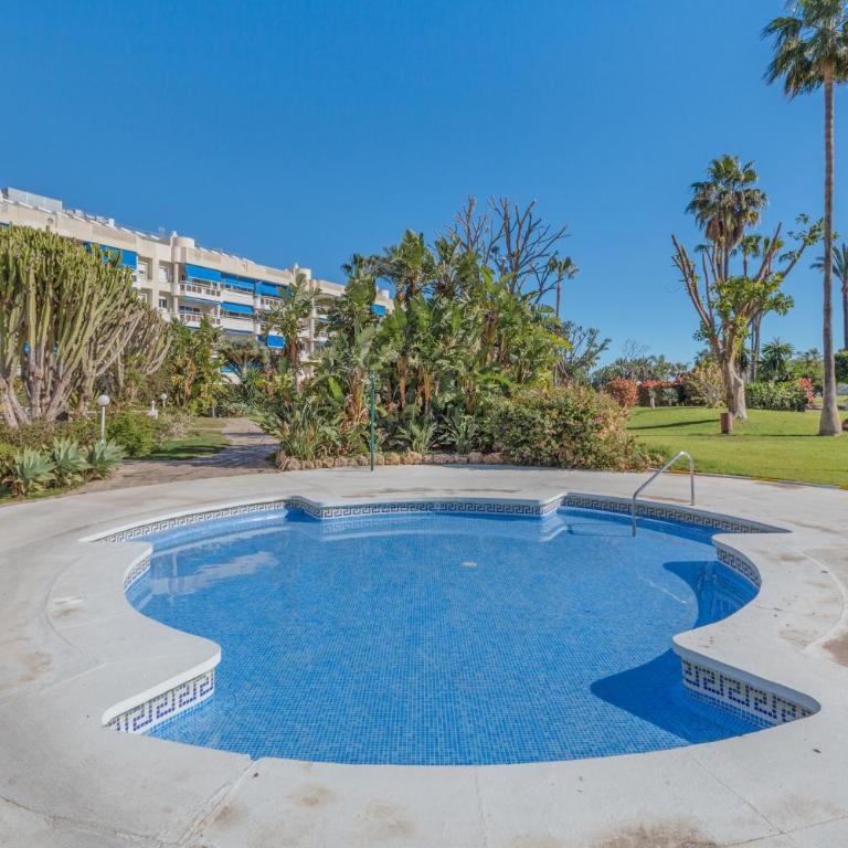 Apartamento Junto al Mar Costa Lago - Apartamento Deluxe de 2 dormitorios con vistas al jardín - 24