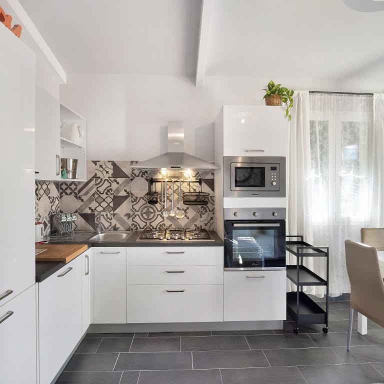 Casa Girasole 600 mt dal mare - Appartamento Deluxe con 2 Camere da Letto e Vista Giardino - 9