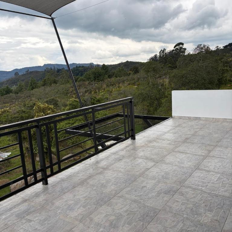Villa El Encanto Casa campestre con fogata y vista - Villa con vistas al jardín - 24