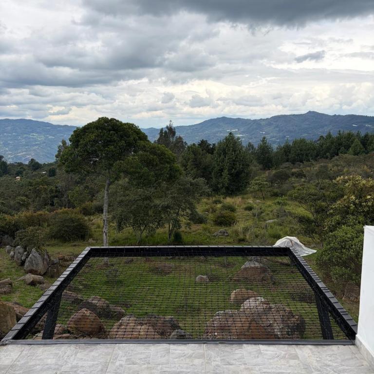Villa El Encanto Casa campestre con fogata y vista - Villa con vistas al jardín - 25