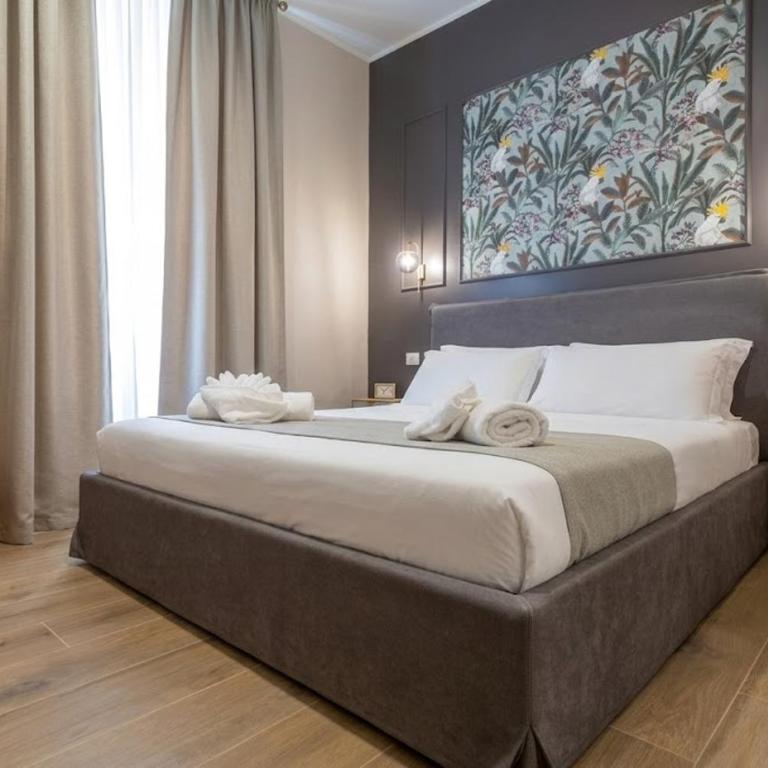 THE SUITEST CHARME Boutique Holiday Apartment Zona Colosseo - Appartamento Premium con 3 Camere da Letto - 1