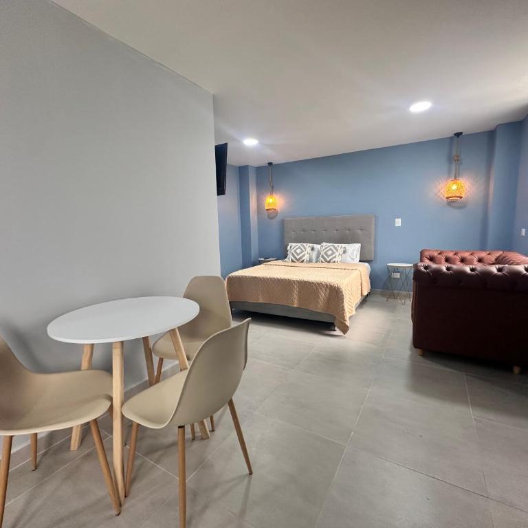 Amaranto Suites - Habitación Cuádruple Confort - 4