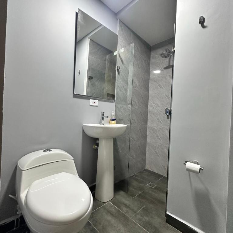 Amaranto Suites - Habitación Cuádruple Confort - 1