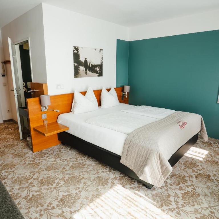 AlpenParks Hotel Maria Alm - Deluxe Doppelzimmer mit Balkon - 10
