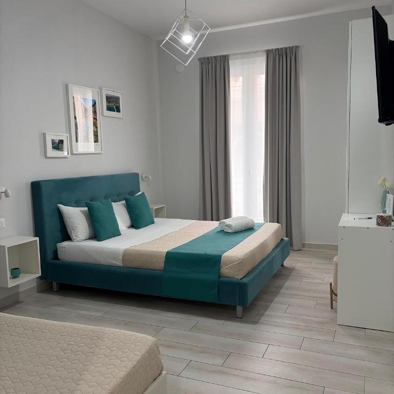 Bilateral B&B - Camera Tripla con Bagno Privato - 2