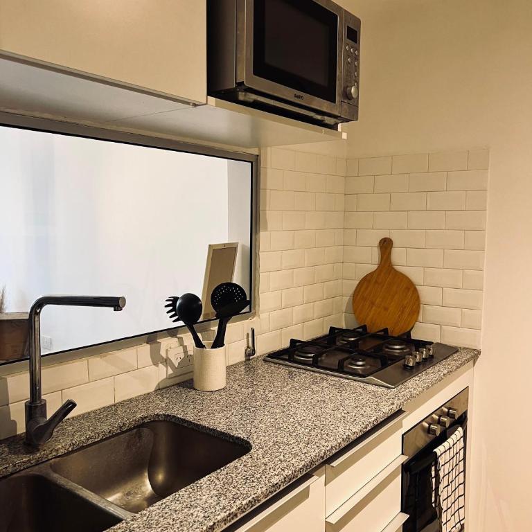 Studio 60 - Monoambiente premium con terraza y pileta - Apartamento de 1 dormitorio - 12