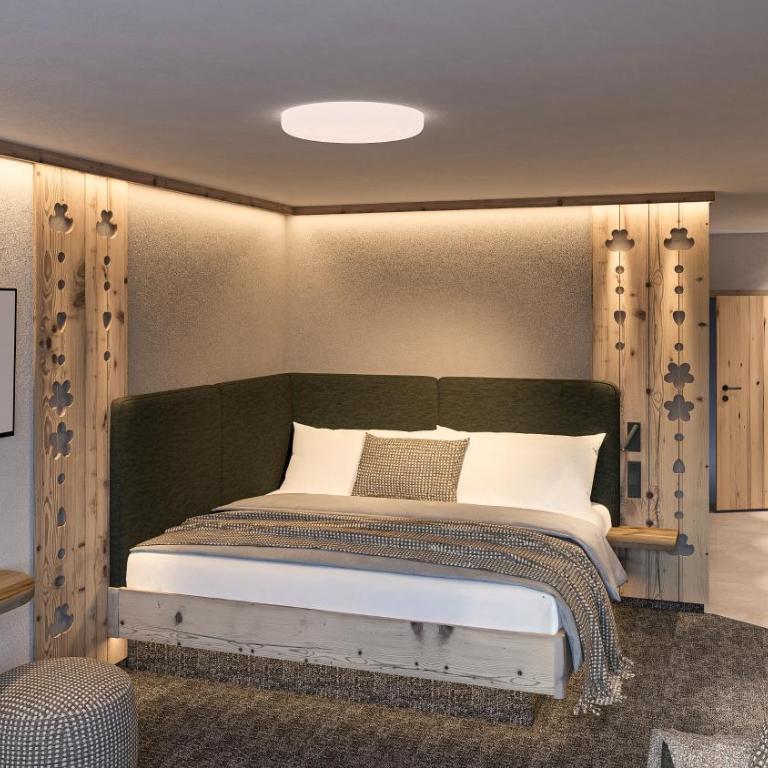 Schiefergut Family Resort Flachau - Zimmer mit Kingsize-Bett und Bergblick - 1