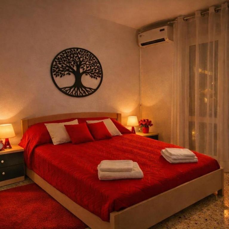 APPARTAMENTO ROSSO - OVER THE RAINBOW APARTMENTS LIDO di JESOLO A 200m dalla Spiaggia Posto Auto Aria Condizionata e Terrazza - Appartamento con 1 Camera da Letto - 2