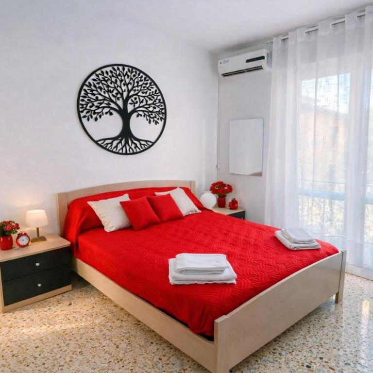 APPARTAMENTO ROSSO - OVER THE RAINBOW APARTMENTS LIDO di JESOLO A 200m dalla Spiaggia Posto Auto Aria Condizionata e Terrazza - Appartamento con 1 Camera da Letto - 1