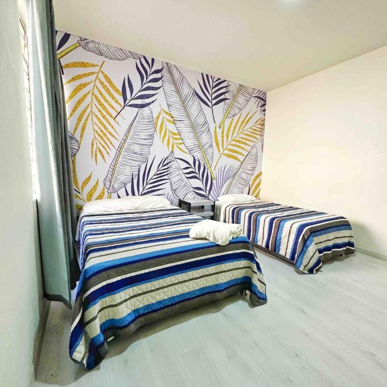 DEpa 1 Americana 2 habitaciones 4 camas matrimoniales hasta 8 huespedes - Two-Bedroom Apartment - 22
