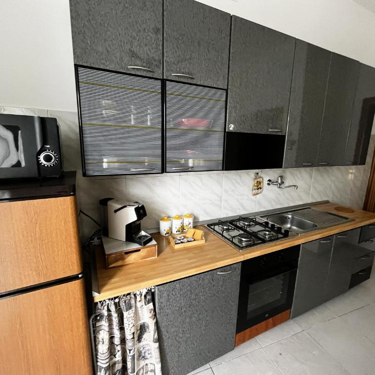 Casa Irrose, bilocale completo di tutti i servizi, in zona tranquilla - One-Bedroom Apartment - 7