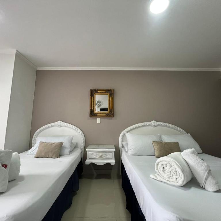 Hotel Suite Santa Rosa - Habitación Cuádruple Estándar - 16