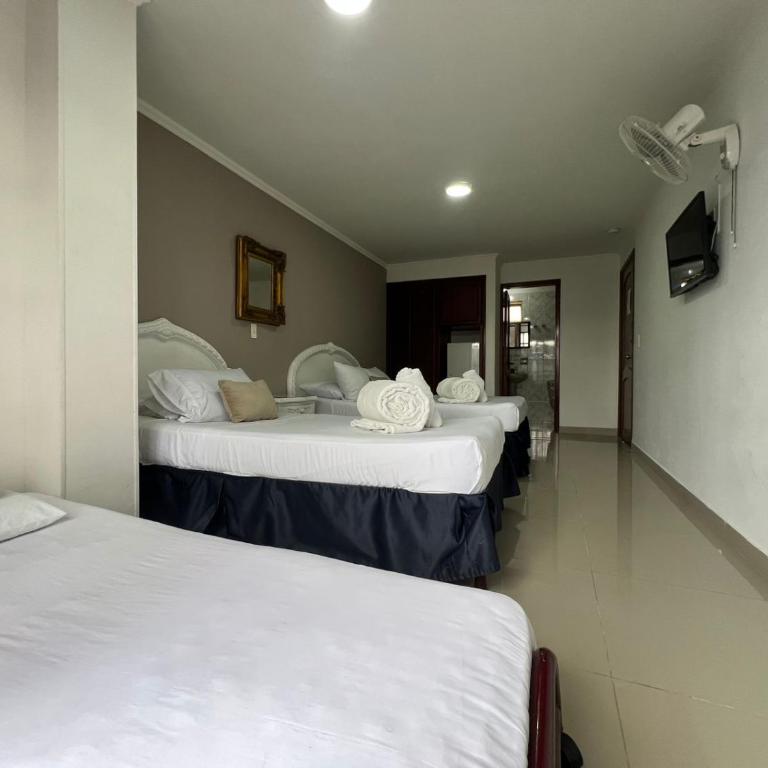 Hotel Suite Santa Rosa - Habitación Cuádruple Estándar - 14