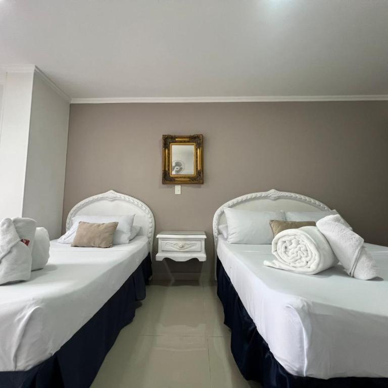 Hotel Suite Santa Rosa - Habitación Cuádruple Estándar - 9
