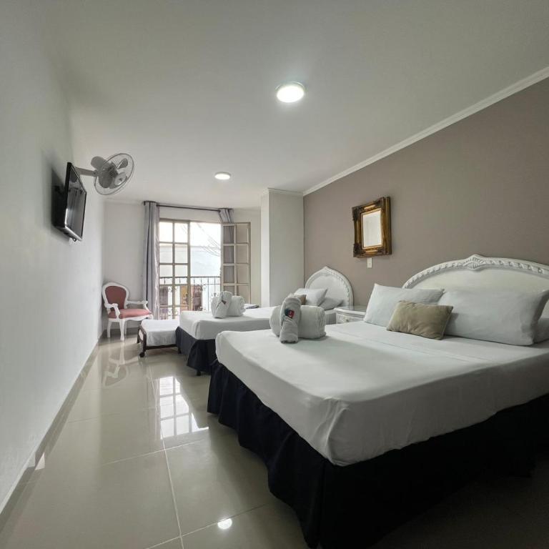 Hotel Suite Santa Rosa - Habitación Cuádruple Estándar - 6
