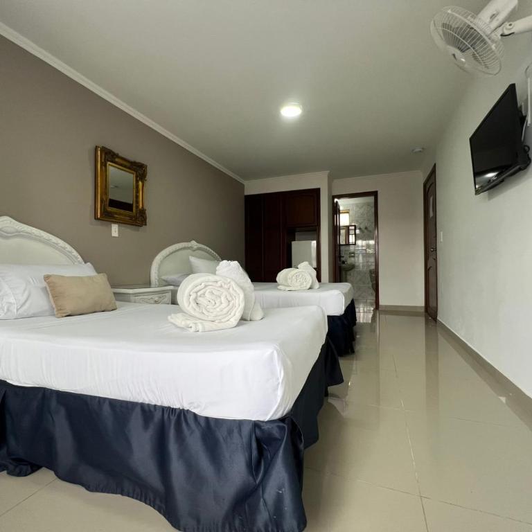 Hotel Suite Santa Rosa - Habitación Cuádruple Estándar - 8